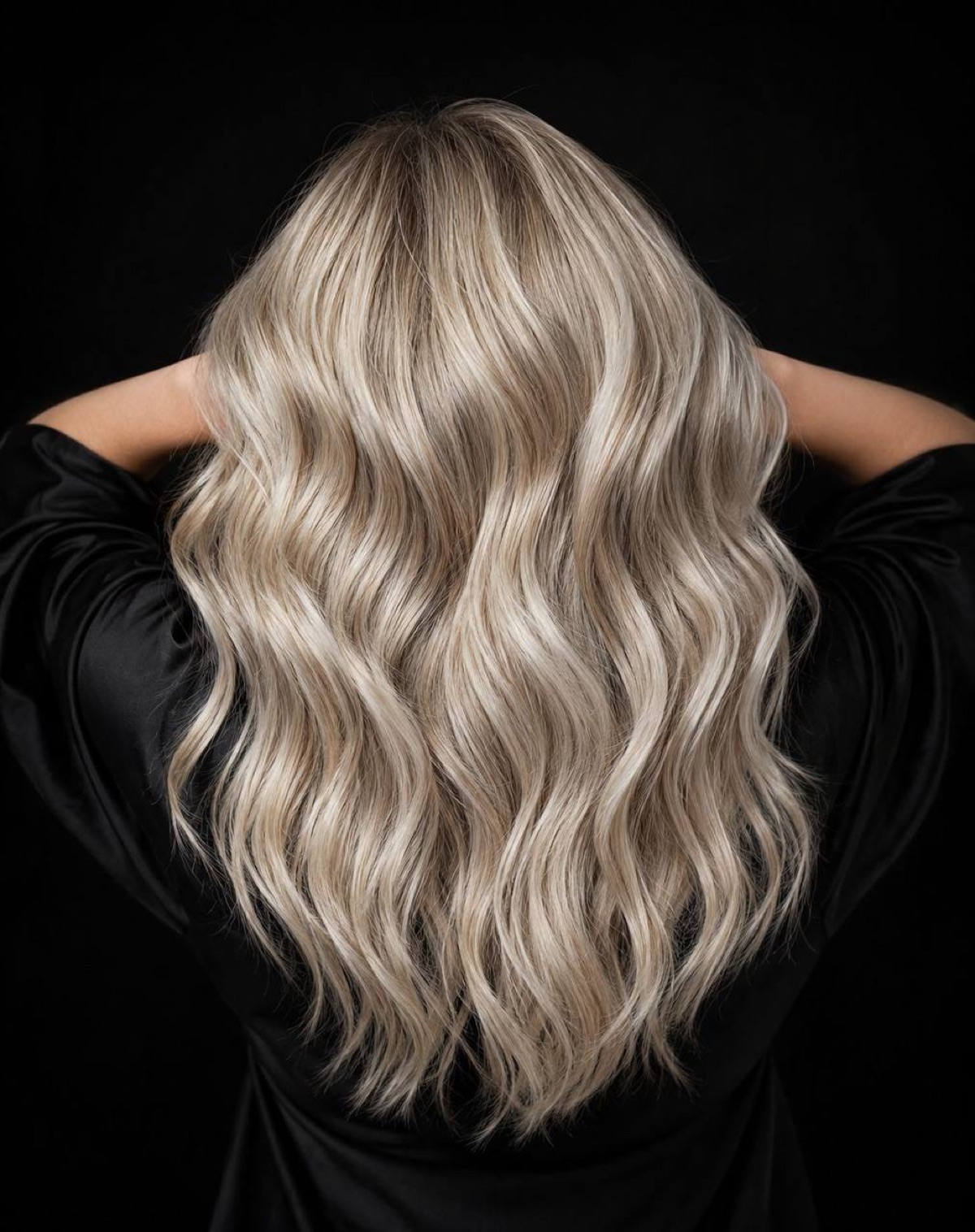 Soft dimensional blonde waves by Storm at The Studio